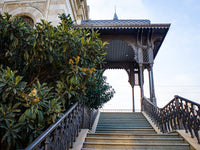 Wrought iron railings on the porch